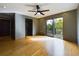 Bedroom features include hardwood floors, closet, ensuite bath, and access to a balcony with a view at 1793 N Fort Harrison Ave, Clearwater, FL 33755