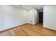 Bedroom featuring hardwood floors, neutral walls, recessed lighting, and door to another room at 1793 N Fort Harrison Ave, Clearwater, FL 33755
