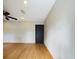 Bedroom featuring a ceiling fan, recessed lighting, and wood flooring at 1793 N Fort Harrison Ave, Clearwater, FL 33755