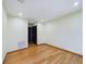 This bedroom offers hardwood floors, recessed lighting, and a double closet for ample storage at 1793 N Fort Harrison Ave, Clearwater, FL 33755