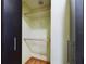 A closet with two shelves and clothing rods at 1793 N Fort Harrison Ave, Clearwater, FL 33755