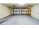 Two car garage with two garage doors and a clean concrete floor at 1793 N Fort Harrison Ave, Clearwater, FL 33755