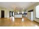 Open kitchen with breakfast bar, stainless steel appliances and open living room at 1793 N Fort Harrison Ave, Clearwater, FL 33755