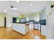 Beautiful kitchen with stainless steel appliances, granite countertops, and breakfast bar at 1793 N Fort Harrison Ave, Clearwater, FL 33755