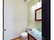 Clean powder room featuring a vessel sink and tiled floors at 1793 N Fort Harrison Ave, Clearwater, FL 33755