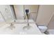 Bathroom features a double sink vanity with white countertops and a large mirror at 5406 Fishhawk Ridge Dr, Lithia, FL 33547