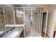 Modern bathroom featuring glass enclosed shower, granite counters and a single vanity at 5406 Fishhawk Ridge Dr, Lithia, FL 33547