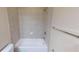 Bathroom with combined shower and tub and tile surround at 5406 Fishhawk Ridge Dr, Lithia, FL 33547