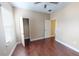 Spacious bedroom featuring hardwood floors and closet at 5406 Fishhawk Ridge Dr, Lithia, FL 33547