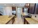 Modern kitchen featuring stainless steel appliances and spacious granite countertops at 5406 Fishhawk Ridge Dr, Lithia, FL 33547