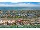 Waterfront condos feature boat docks, a community pool, lush landscaping and ocean views at 722 Pinellas Bayway S # 102, St Petersburg, FL 33715
