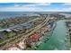 Waterfront condos feature boat docks, a community pool, lush landscaping and beautiful ocean views at 722 Pinellas Bayway S # 102, St Petersburg, FL 33715