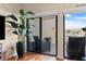 Balcony with views of the water, sliding glass doors, and dark wicker furniture at 722 Pinellas Bayway S # 102, St Petersburg, FL 33715