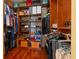 Spacious walk-in closet with custom wood shelving for clothing and accessories storage at 722 Pinellas Bayway S # 102, St Petersburg, FL 33715