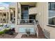 The back of the condos boast garage access and private patios with views of the shared pool at 722 Pinellas Bayway S # 102, St Petersburg, FL 33715