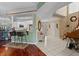 Open foyer featuring a staircase and bar seating at 722 Pinellas Bayway S # 102, St Petersburg, FL 33715