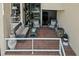 Relaxing tiled patio with comfortable seating and views at 722 Pinellas Bayway S # 102, St Petersburg, FL 33715
