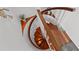 Spiral staircase with wood steps at 722 Pinellas Bayway S # 102, St Petersburg, FL 33715