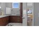 Modern bathroom with granite countertops and ample storage, offers a spa-like retreat, located just off bedroom at 764 S Mccall Rd, Englewood, FL 34223