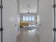 Bright bedroom with scenic water views, complemented by hardwood floors and open doorway at 764 S Mccall Rd, Englewood, FL 34223