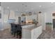 Spacious kitchen featuring a large island, stainless steel appliances, and abundant storage at 764 S Mccall Rd, Englewood, FL 34223