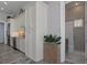 Well-appointed kitchen with stainless steel appliances and access to a modern bathroom at 764 S Mccall Rd, Englewood, FL 34223