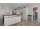 Well-appointed kitchen with stainless steel appliances and access to a modern bathroom at 764 S Mccall Rd, Englewood, FL 34223