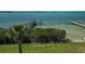 Waterfront view of a private dock on a sunny day at 764 S Mccall Rd, Englewood, FL 34223
