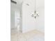 Dining area features modern lighting and tile flooring at 10169 Holly Berry Dr, Weeki Wachee, FL 34613