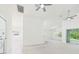 Open-concept living space with access to the dining and outdoor areas at 10169 Holly Berry Dr, Weeki Wachee, FL 34613
