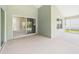 Covered patio features a sliding glass door to the indoors at 10169 Holly Berry Dr, Weeki Wachee, FL 34613