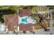 Aerial view of community center featuring a large pool, spa, and recreational facilities at 341 Outrigger Pl, North Port, FL 34287