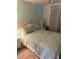Comfortable bedroom with a queen-size bed and coordinated decor in soft tones at 341 Outrigger Pl, North Port, FL 34287