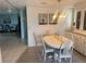 The dining room features an adjacent hutch and nice decor at 341 Outrigger Pl, North Port, FL 34287