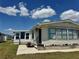 Charming single-story home with well-maintained landscaping and neutral siding at 341 Outrigger Pl, North Port, FL 34287