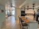 Bright kitchen boasts a large island with bar seating and stainless steel appliances at 341 Outrigger Pl, North Port, FL 34287