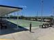 Daytime view of the well maintained community shuffleboard courts at 341 Outrigger Pl, North Port, FL 34287