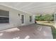 Covered patio extends living space to the outdoors, perfect for relaxing at 1103 W Dixie St, Plant City, FL 33563