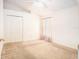 Bedroom features carpet, a window with patterned curtains, and a closet at 11924 Northumberland Dr, Tampa, FL 33626