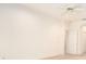 Living room with ceiling fan and a doorway leading to the bathroom at 11924 Northumberland Dr, Tampa, FL 33626