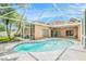 Sparkling pool surrounded by a screened enclosure, offering a refreshing retreat and outdoor living at 11924 Northumberland Dr, Tampa, FL 33626