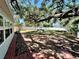Enjoy the outdoors in this backyard with mature shade trees at 4201 S Renellie Dr, Tampa, FL 33611