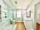 Modern bathroom with a glass-enclosed shower, stylish vanity, and updated fixtures at 4201 S Renellie Dr, Tampa, FL 33611