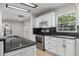 Bright kitchen with granite countertops, stainless steel appliances, and a view from the window at 6317 Discovery Ln, Land O Lakes, FL 34638