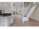 Bright and airy living room with wood floors and large windows overlooking the outdoors at 6317 Discovery Ln, Land O Lakes, FL 34638