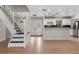 Open floorplan with staircase leading to upper floor at 6317 Discovery Ln, Land O Lakes, FL 34638