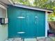 Exterior of a well constructed storage shed featuring a sturdy door with robust hinges at 1808 Heather Ave, Tampa, FL 33612