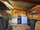 Interior of a well-lit shed with shelving, perfect for organized storage of various household items and equipment at 1808 Heather Ave, Tampa, FL 33612