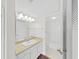 Bathroom featuring a vanity and a view into the shower and toilet area at 3211 W Swann Ave # 911, Tampa, FL 33609