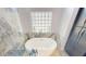 Modern bathroom featuring a soaking tub, and stylish fixtures at 4506 Gentrice Dr, Valrico, FL 33596